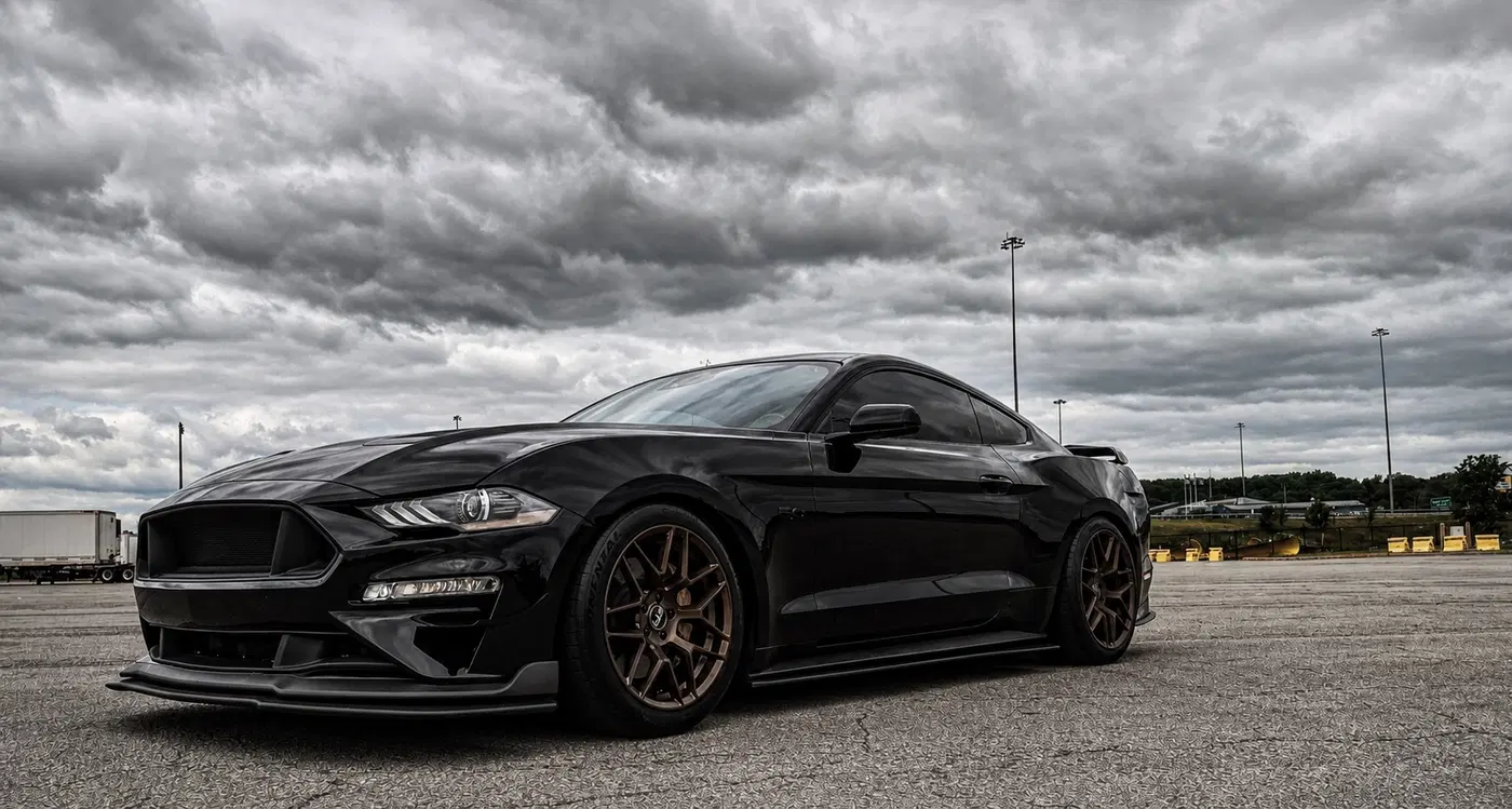 AI-generated view of a 2021 Ford Mustang GT 401A with RTR Tech 7 wheels