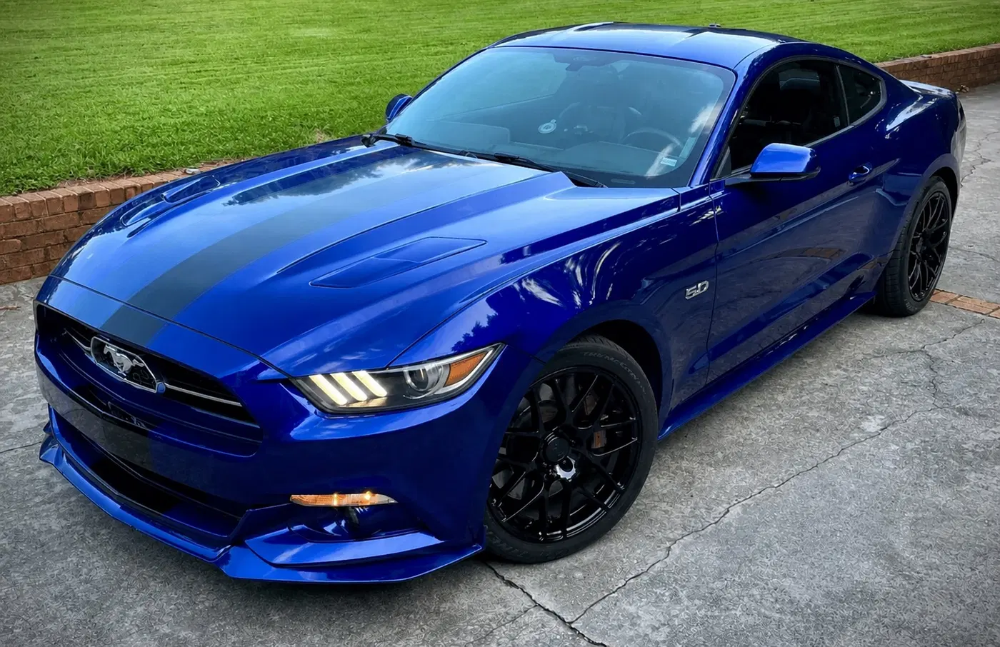 AI-generated view of a 2015 Ford Mustang GT 50th Anniversary Edition with AMR N/A wheels