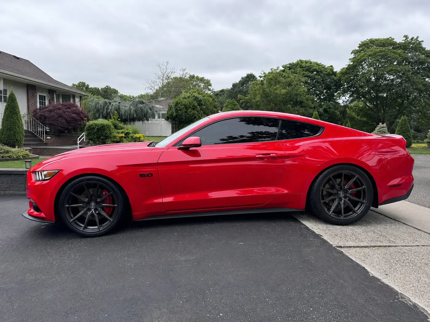 AI-generated view of a 2016 Ford Mustang GT Premium with Vossen HF3 wheels