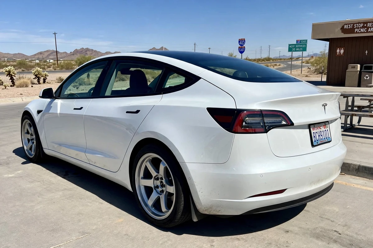 AI-generated view of a 2023 Tesla Model 3 RWD with Rays TE37 wheels