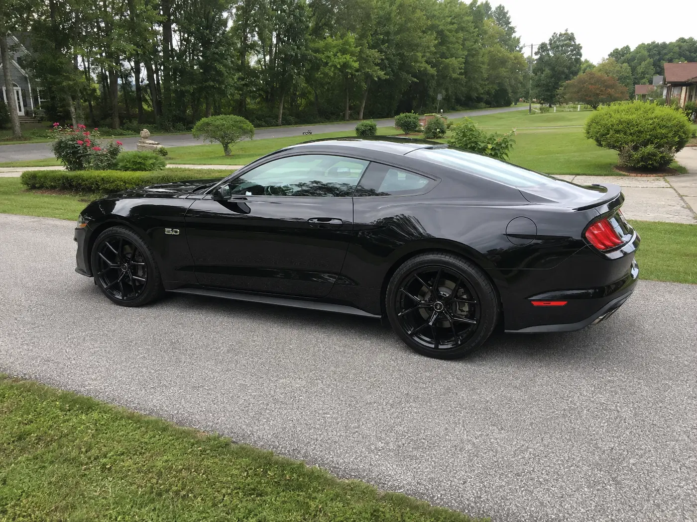 AI-generated view of a 2018 Ford Mustang GT with Shelby Cs-3 wheels