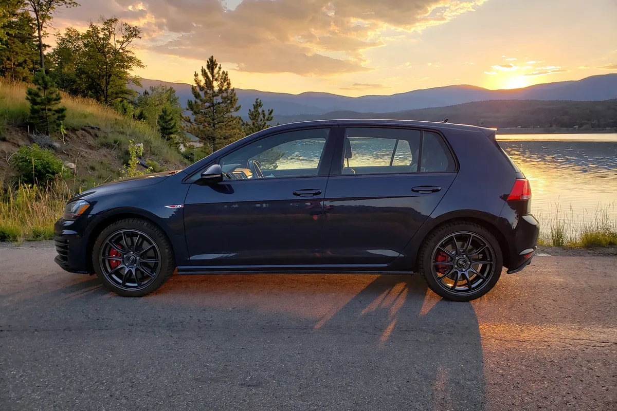 AI-generated view of a 2016 Volkswagen GTI with OZ Hyper GT wheels