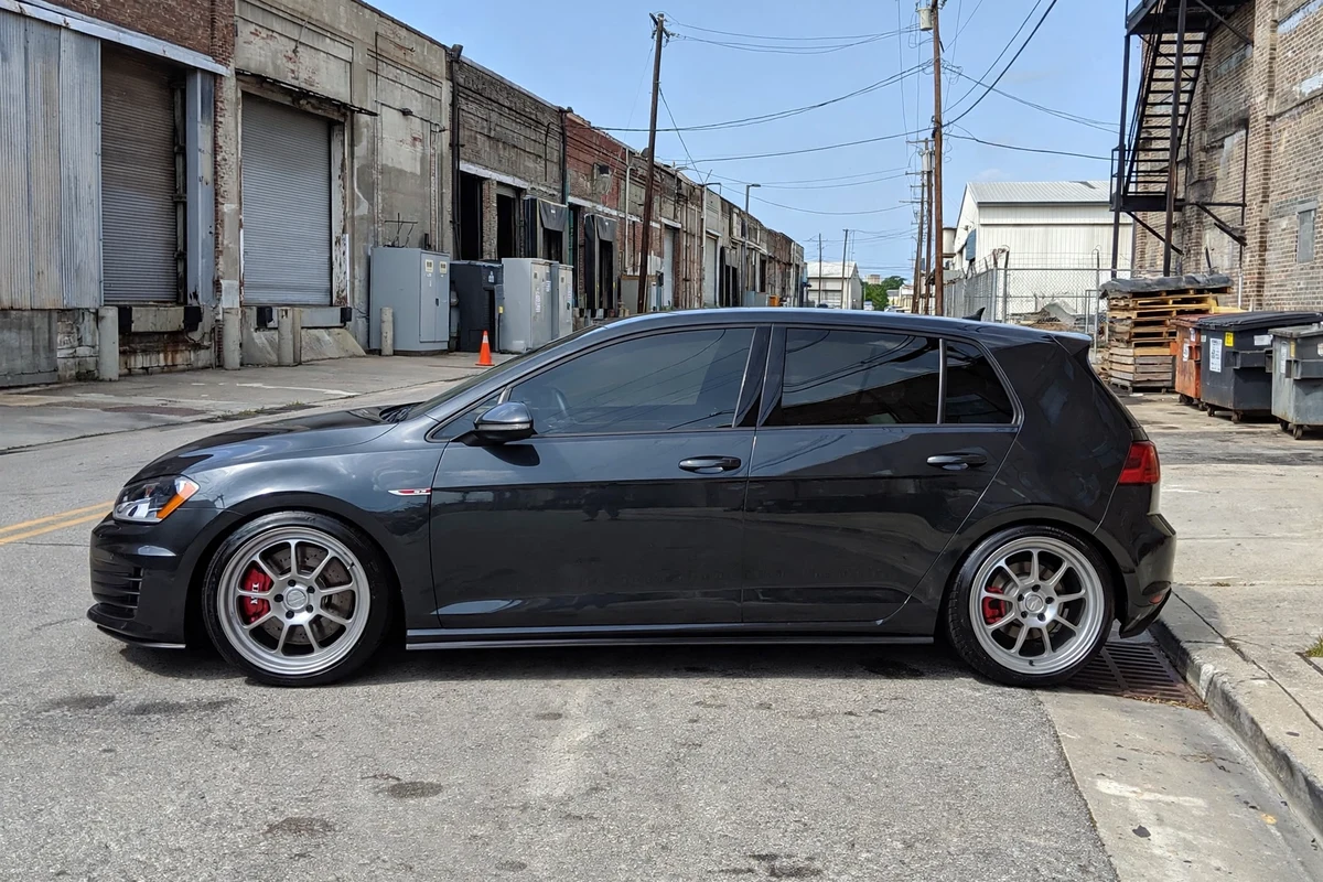 AI-generated view of a 2016 Volkswagen GTI with Motegi MR135 wheels